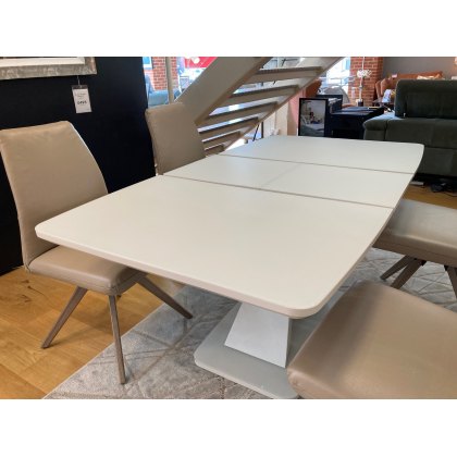 Arcalia Extending Dining Table and Four Hansen Chairs Clearance